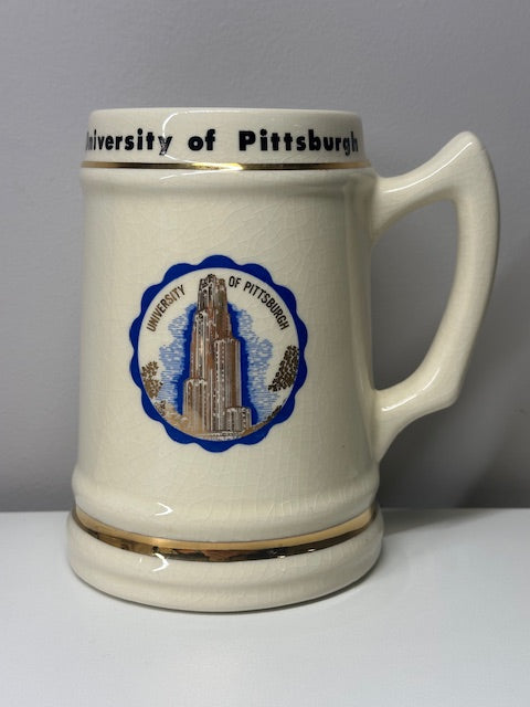 University of Pittsburg Stein- Creme w/ Blue Logo Gold Trimming