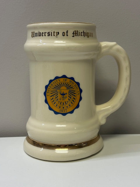 University of Michigan 1817 Stein- Creme w/ Logo Gold Trimmings